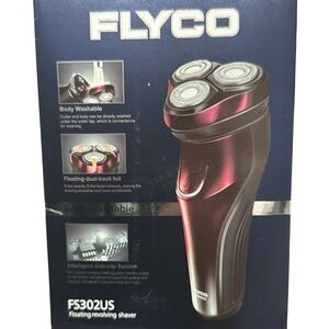 New in Box Floating Revolving Electric Shaver